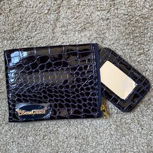 Senegence pocket mirror with small pouch